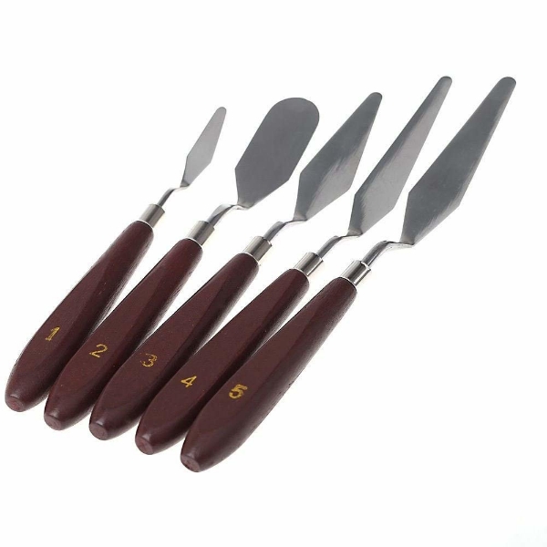 Premium Vector  Metal palette knives of various shapes for oil painting palette  knife icon